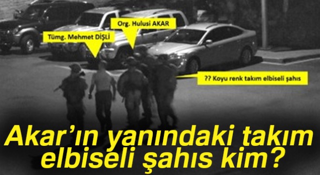 Akar’ın yanındaki takım elbiseli şahıs kim?